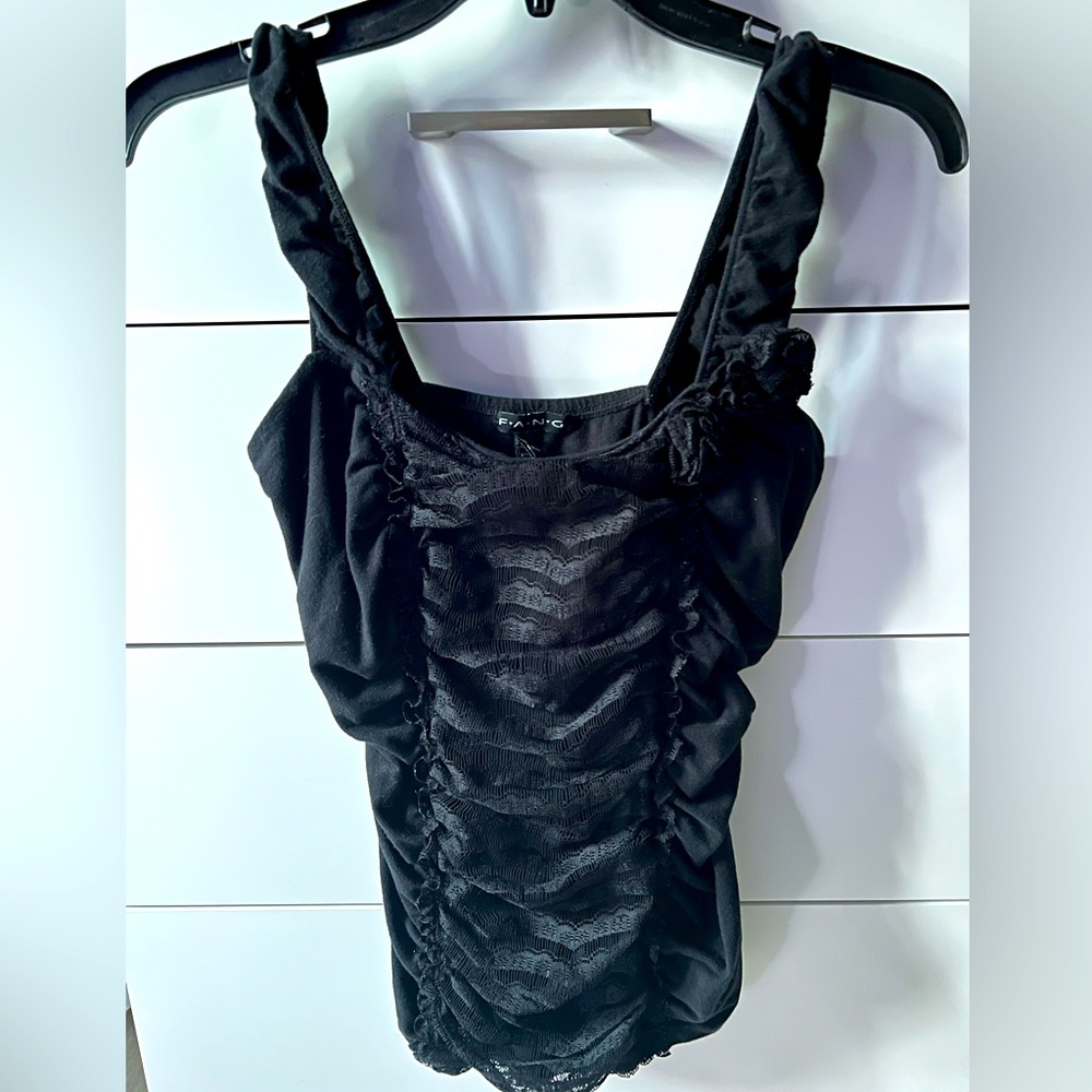 Sleeveless Black FANG top w/ lace and some flowers at the top Size M asking 15$